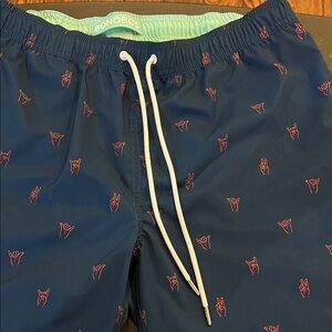 Bonobos Blue Swim Shorts with Red Pattern hand signs asl